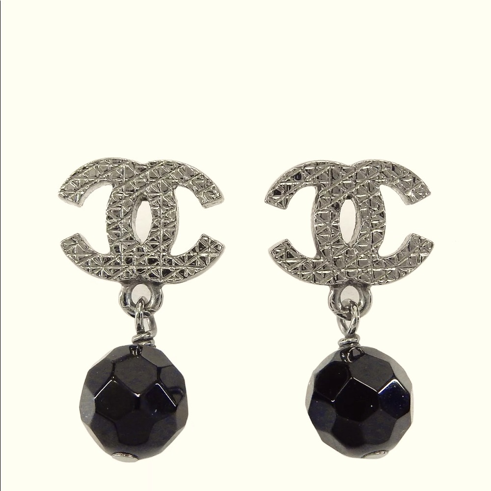 Authentic Chanel earrings one of the stamped code came off